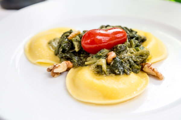 Ravioli con Scarola, Taleggio, Pomodorino e Noci di Sorrento